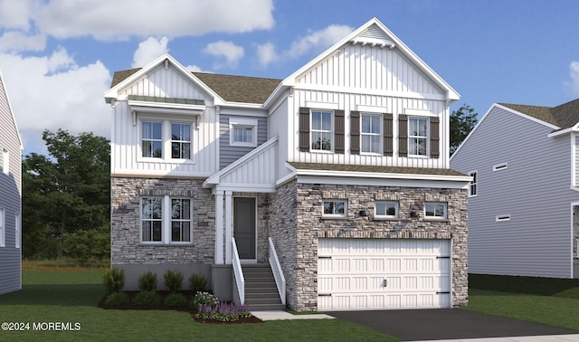 view of front facade featuring a front yard and a garage