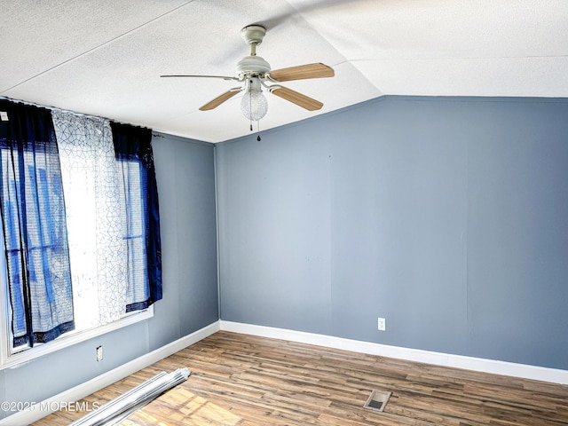 8 Monique Cir, Hazlet, NJ 07730 - unfurnished room with wood finished floors, visible vents, ceiling fan, and a textured ceiling