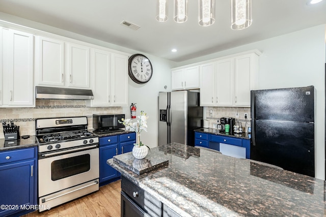 kitchen featuring backsplash, black appliances, blue cabinetry, decorative light fixtures, and white cabinetry