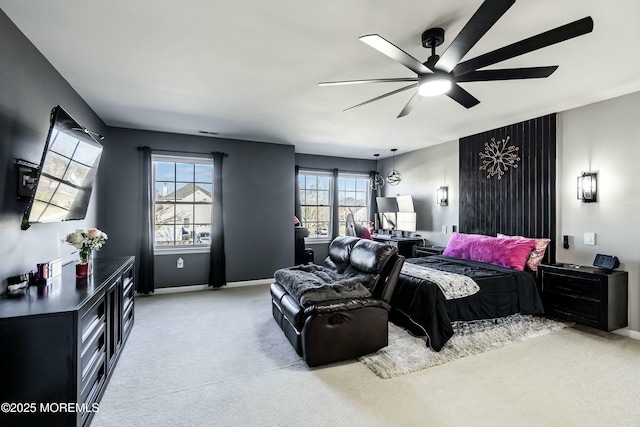 carpeted bedroom featuring ceiling fan