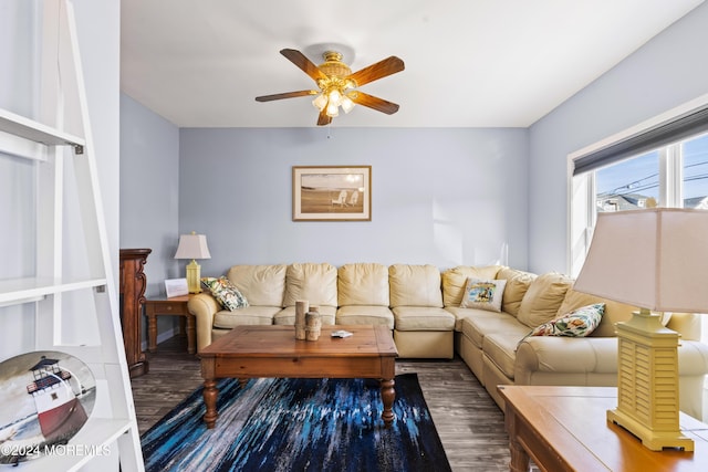 living room with wood-type flooring and ceiling fan