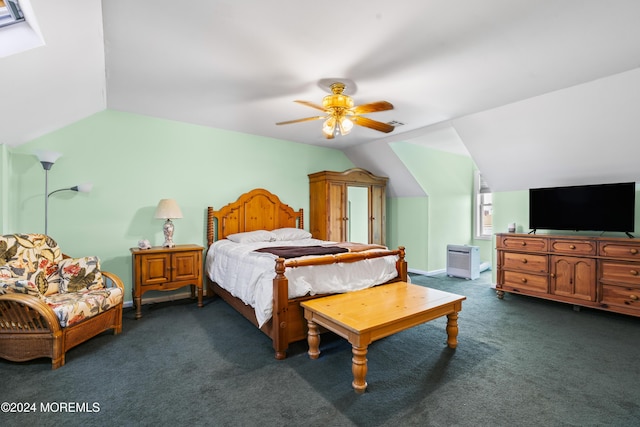 carpeted bedroom with ceiling fan and lofted ceiling