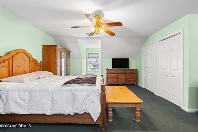 bedroom featuring dark carpet, ceiling fan, and lofted ceiling