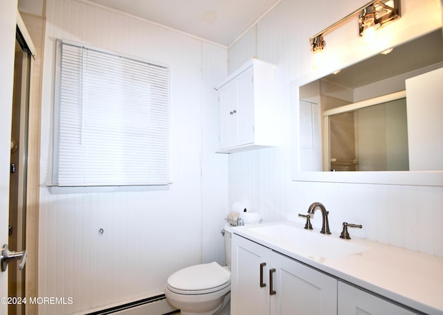 bathroom with a baseboard heating unit, toilet, wooden walls, vanity, and a shower with shower door