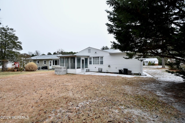 view of front of property featuring a sunroom