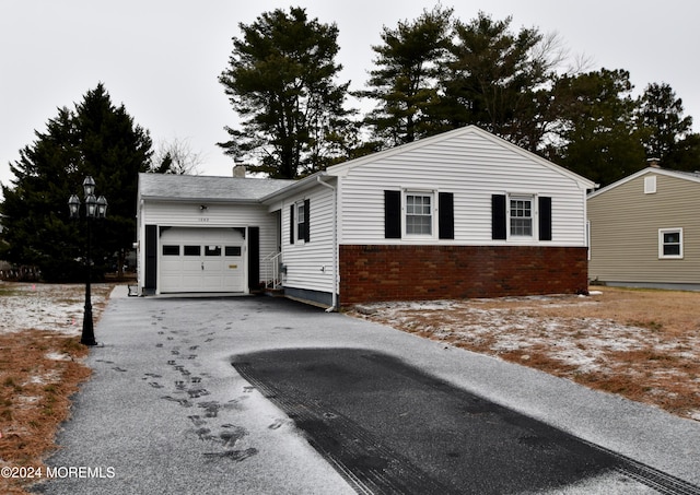 view of front of property featuring a garage