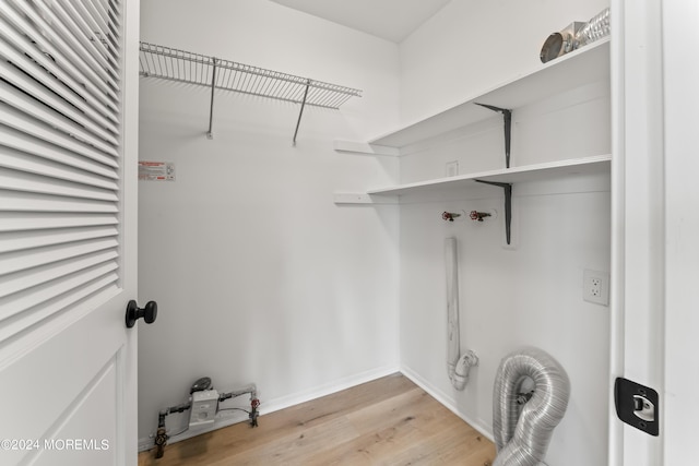 walk in closet featuring light wood-type flooring