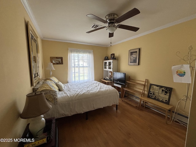 bedroom with ceiling fan, crown molding, and wood-type flooring