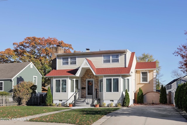 view of property with a front lawn