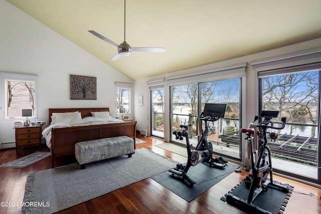 bedroom featuring access to outside, ceiling fan, a water view, high vaulted ceiling, and hardwood / wood-style floors