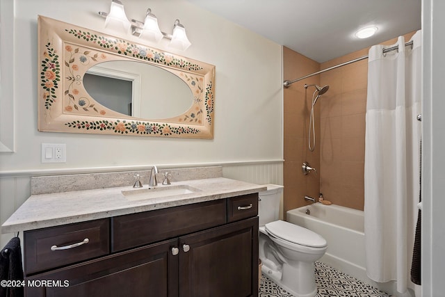 full bathroom featuring vanity, toilet, and shower / bath combo with shower curtain