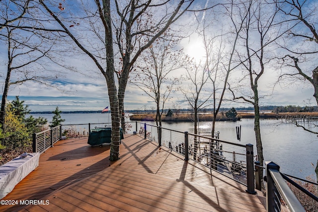 view of dock with a water view