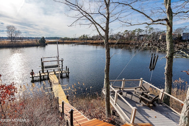 view of dock with a water view