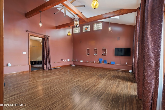 interior space featuring ceiling fan, hardwood / wood-style floors, high vaulted ceiling, and beamed ceiling