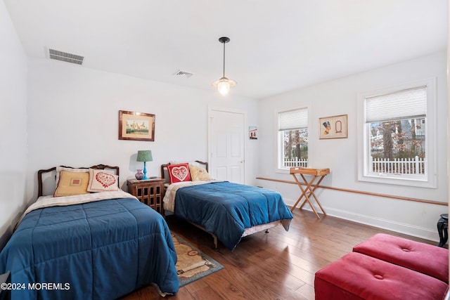 bedroom featuring dark hardwood / wood-style floors