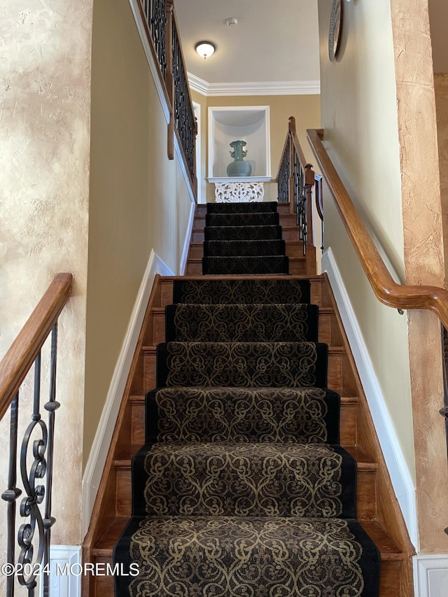 staircase with ornamental molding