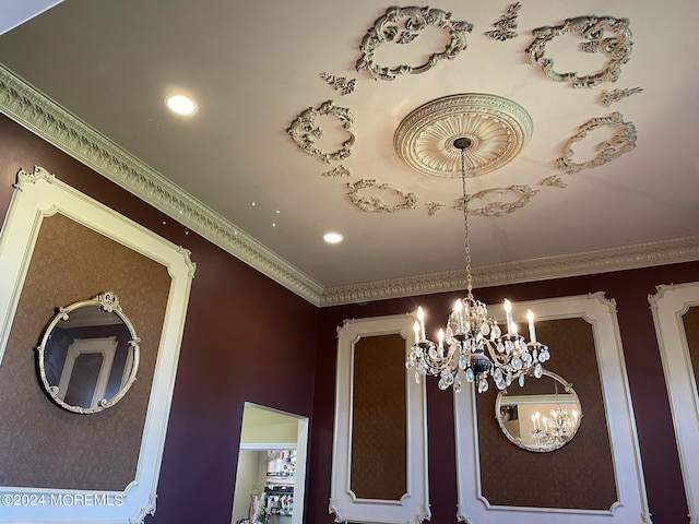 room details featuring crown molding and a chandelier