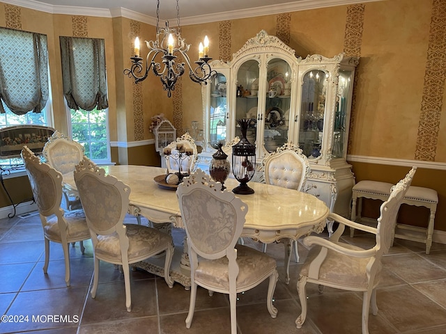 tiled dining space with a notable chandelier and ornamental molding