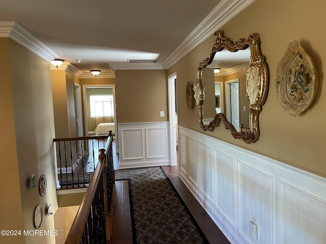 hallway featuring dark hardwood / wood-style floors and ornamental molding