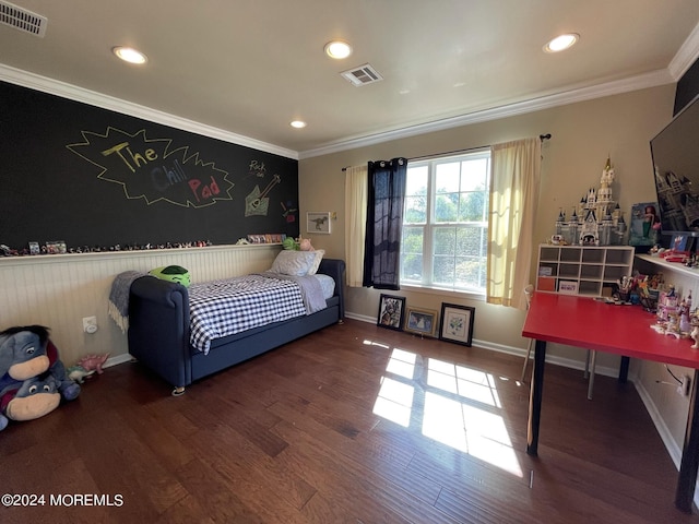 bedroom with wood-type flooring and ornamental molding