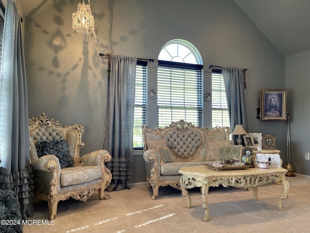 living room with carpet floors and high vaulted ceiling