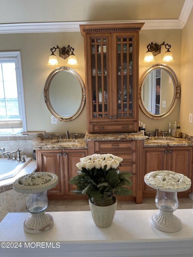 bathroom with vanity, a relaxing tiled tub, and crown molding