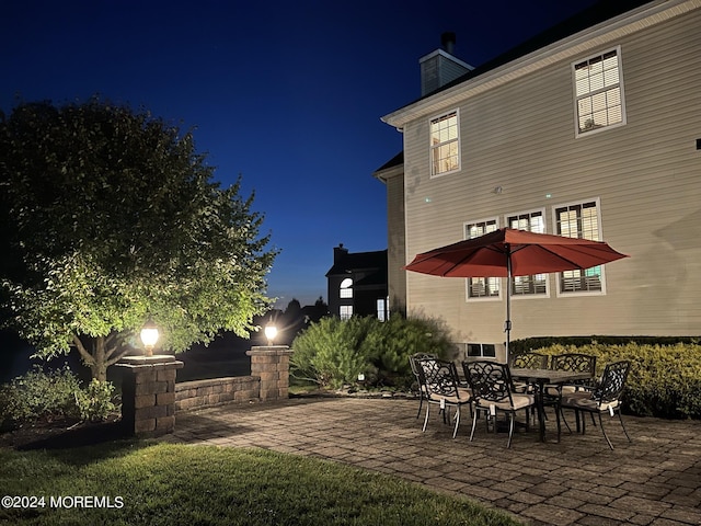 view of patio at twilight