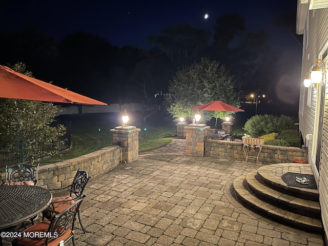 view of patio at night