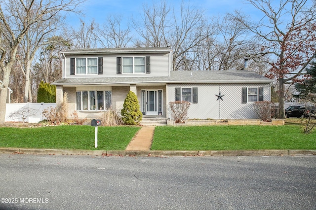 front facade with a front lawn