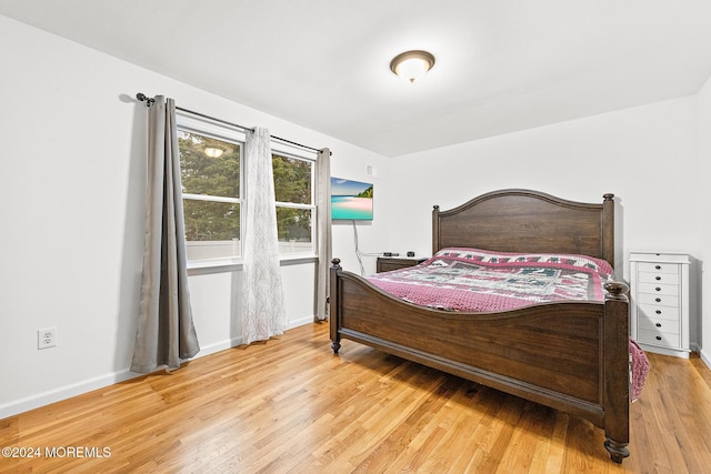 bedroom featuring light wood-type flooring