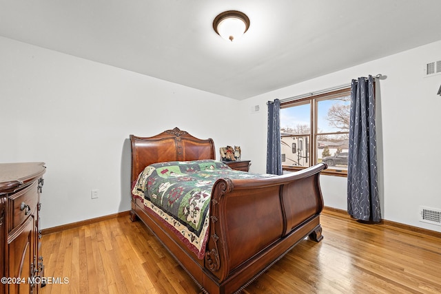 bedroom featuring light hardwood / wood-style floors