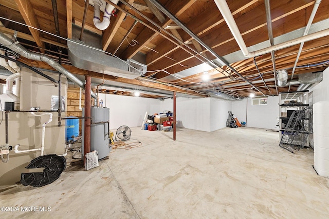 basement featuring gas water heater