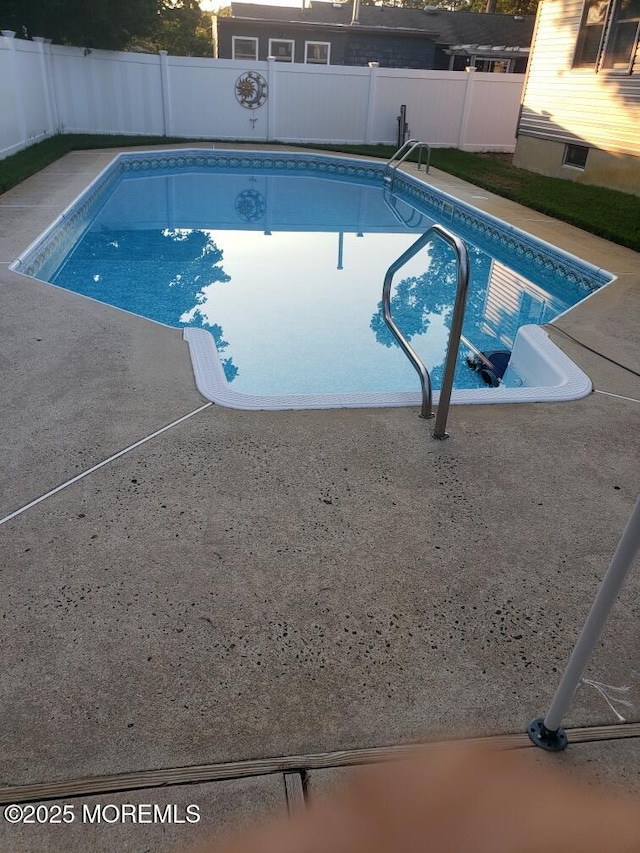 view of pool with a patio