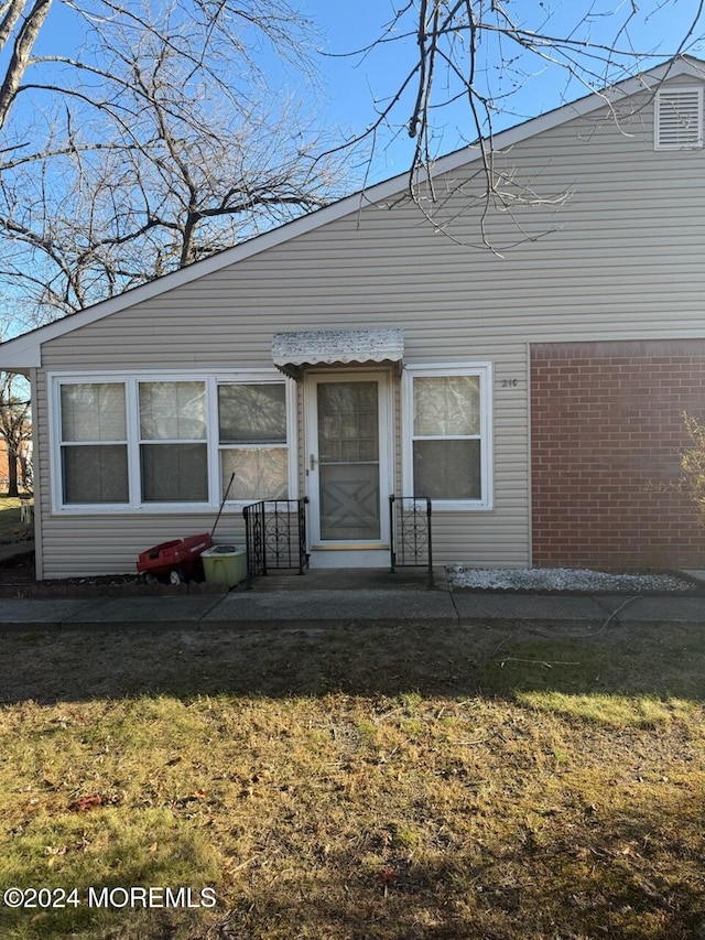 exterior space with a front yard