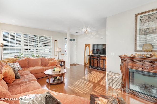 living room with light hardwood / wood-style flooring