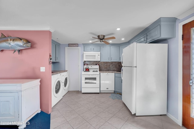 kitchen featuring decorative backsplash, gray cabinetry, white appliances, ceiling fan, and separate washer and dryer