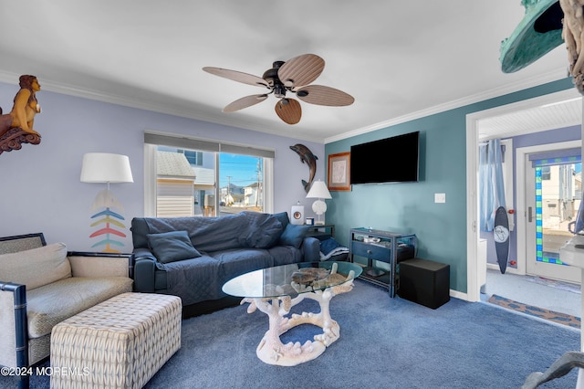 carpeted living room featuring a wealth of natural light, ceiling fan, and ornamental molding