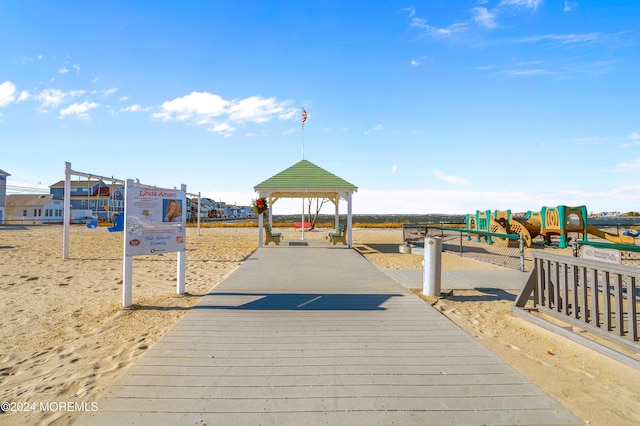 dock area with a gazebo and a playground