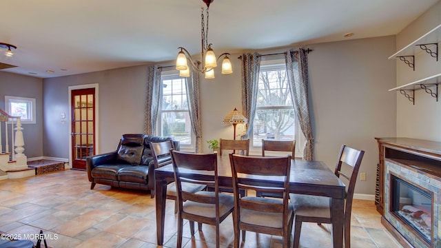 dining room featuring a chandelier