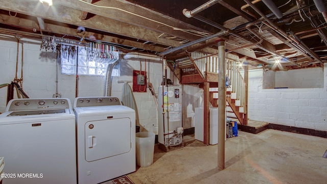 basement with gas water heater and independent washer and dryer