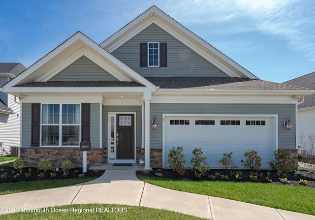 craftsman-style home with central AC