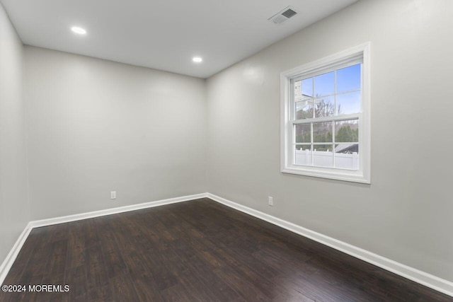 empty room with wood-type flooring