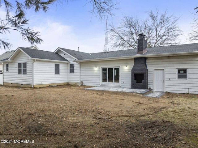 rear view of property with a patio area