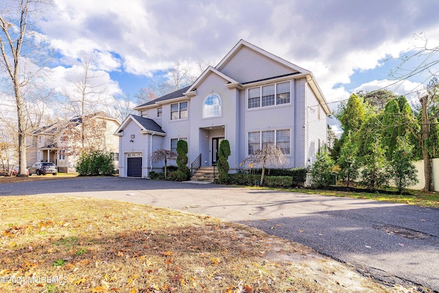 view of property featuring a garage