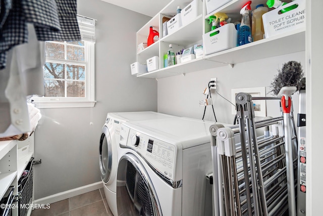 washroom featuring independent washer and dryer and tile patterned floors