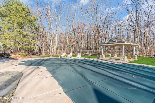 view of swimming pool with a gazebo