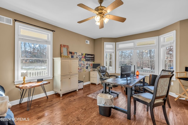 office area with hardwood / wood-style floors and ceiling fan