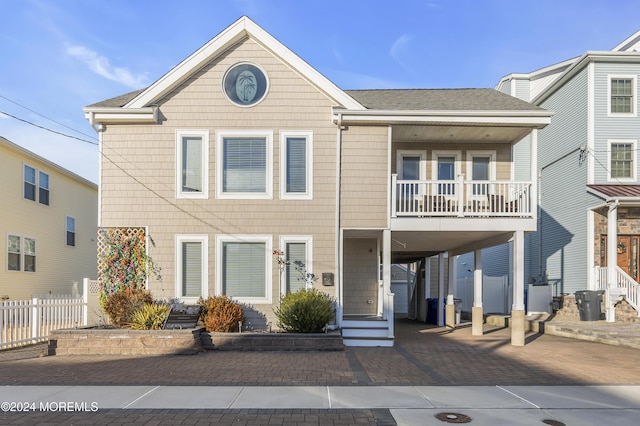 view of front of home with a balcony