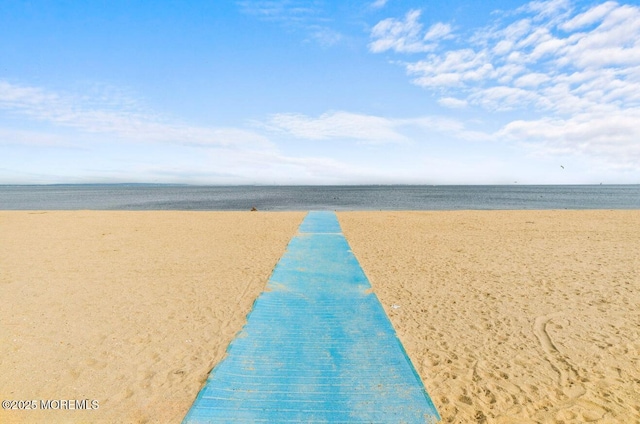 property view of water with a beach view