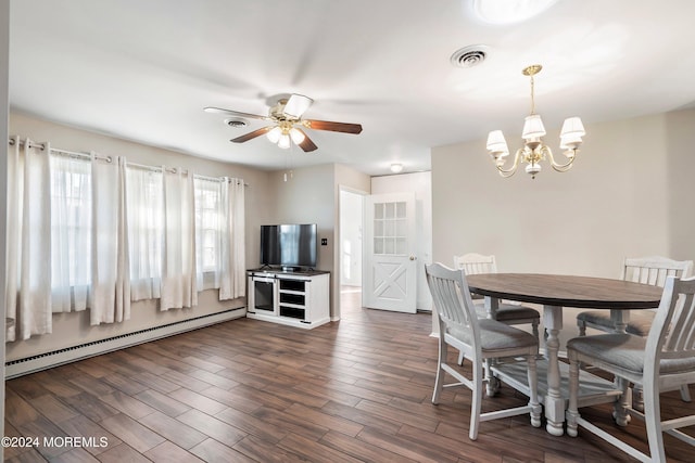 dining space with baseboard heating, ceiling fan with notable chandelier, and dark hardwood / wood-style floors